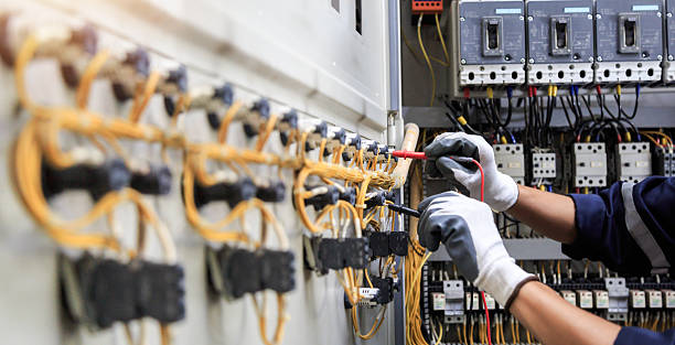 Professional Electrician technician working in Paris, MO
